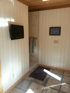  Wood panleing installed and tiled floor 