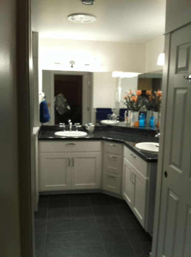  Two vanities with custom coutertop and lighting 