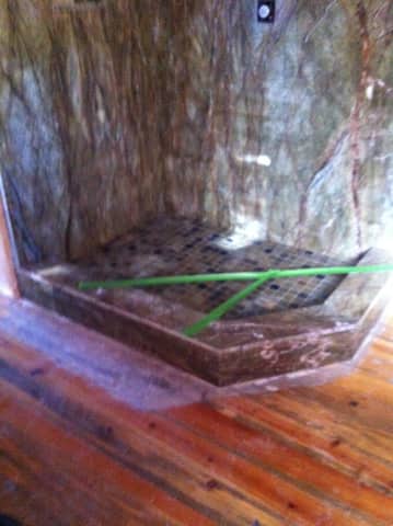  Wood floor installed with custome standing shower 