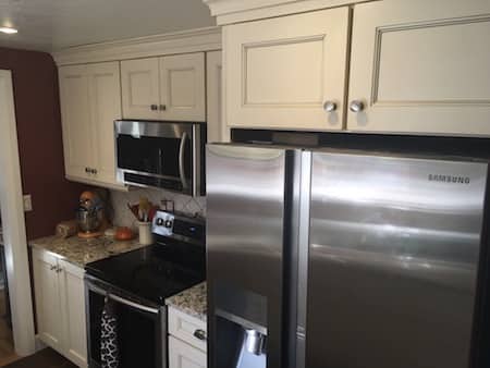  Kitchen coutertops instlled by stove and micorwave 