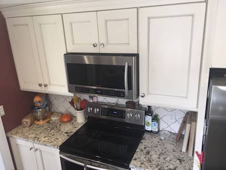  Kitchen coutertops instlled by stove and micorwave 