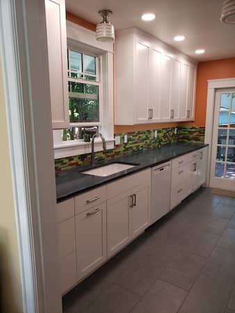  Custom cabinets in large kitchen project with couthertop install and tile backsplash 