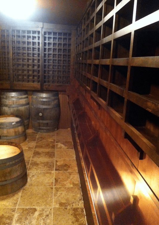  Wine room with custom wooden racks 